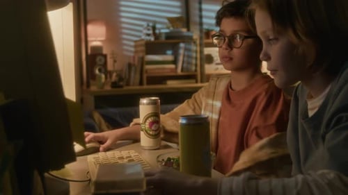 Children Using Retro Computer at Home at Night