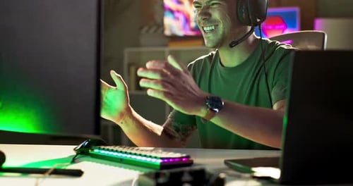 Excited Gamer Plays Video Games on Computer