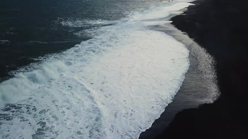 Black Sand Beach with Reynisdrangar Rocks in Iceland