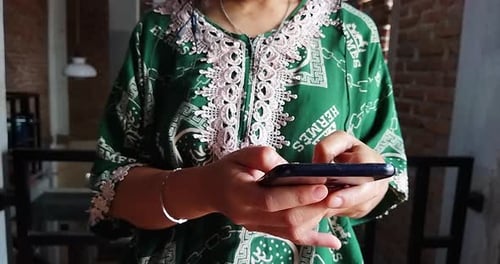 Woman Using Smartphone Device Close Up Indoor
