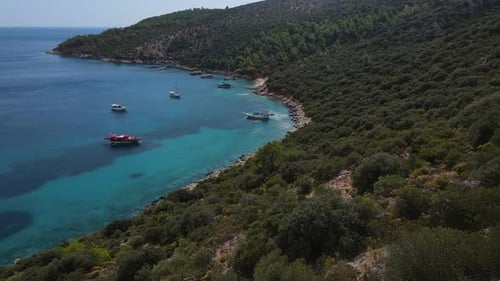 Aerial Beautiful Beach with Many Yachts and Boats at Anchor and Blue Sea
