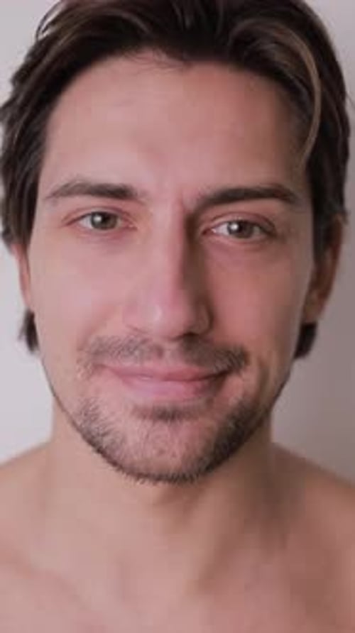 Close Up of Young Adult Man Smiling