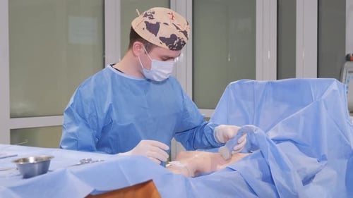 A Surgeon in an OR Performing Surgery with a Hat and Gestures