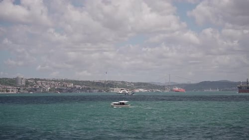 Ships, ferries, boats, historical buildings in the Bosphorus, Istanbul, Turkiye