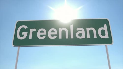 Greenland Road Sign Against Clear Blue Sky With Bright Sunlight