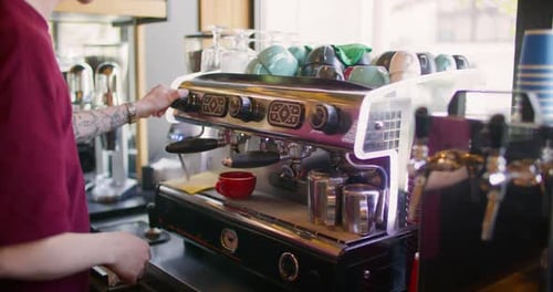 Barista Making Espresso at Cafe During the Day