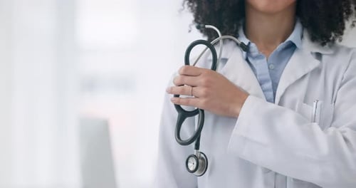 Woman, stethoscope and hand of doctor in healthcare, medical or professional service at hospital