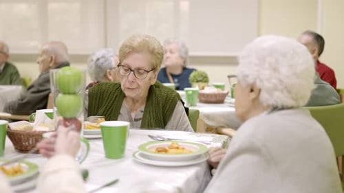 Seniors Gather Together at Mealtime