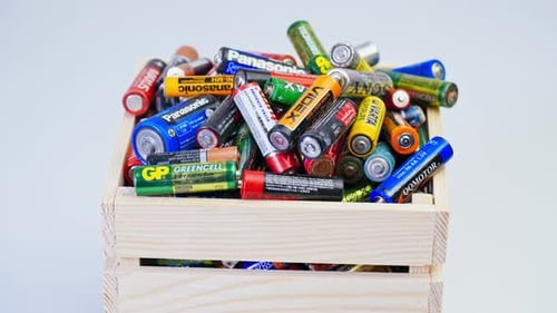 Batteries in a Wood Crate for Recycling