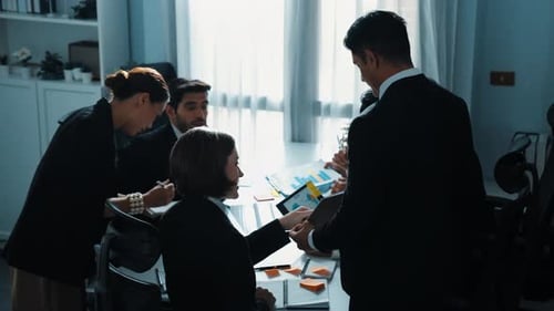 Top view of business people looking at financial chart from tablet. Directorate.