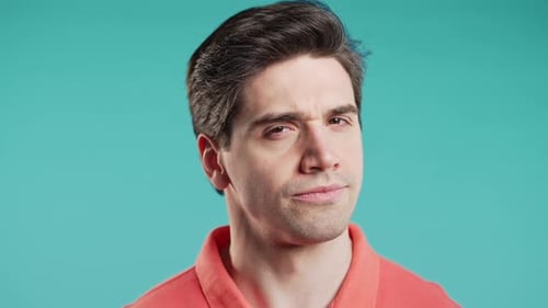 Young Adult Man Looking at Camera, Close Up