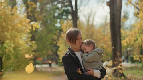 Father and Child Enjoying Park Caucasian Father Joyfully with Toddler Outdoors Happy Caucasian Dad