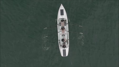 Atlantic Rowing Boat Challenge aerial drone shot. Endurance race across the Atlantic Ocean. Top down