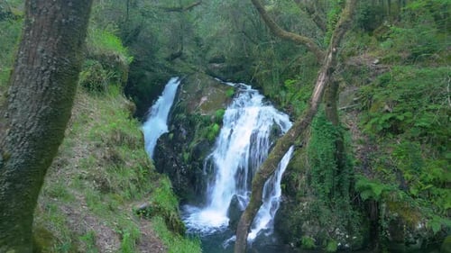 Flying On Santa Leocadia Waterfall In The Wilderness Near Mazaricos In Galicia Spain. Aerial Drone S