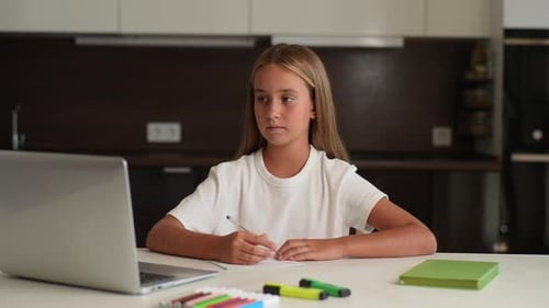 Girl Studying at Home on Laptop