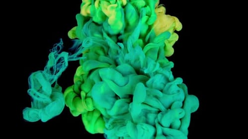 Green Colorful Ink Drops Mix in Water Swirling Underwater on Black Background