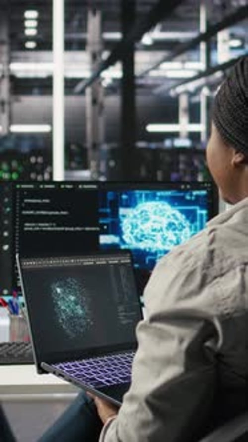 Vertical Video Data Center Admin Uses AI Technology on Laptop for Machine Learning Workloads