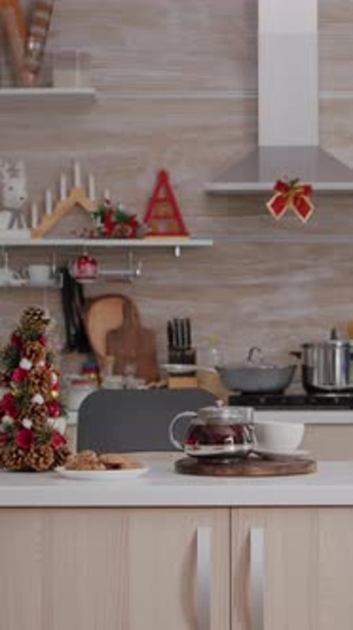 Vertical Video Empty Xmas Decorated Kitchen with Nobody in It is Ready for Christmas Morning Dessert