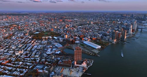 Footage above mainly low-rise buildings in the panorama of New York.