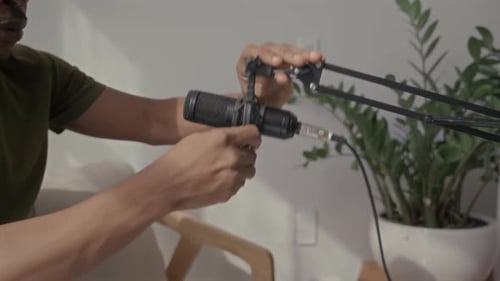 Man with Headphones Preparing to Broadcast
