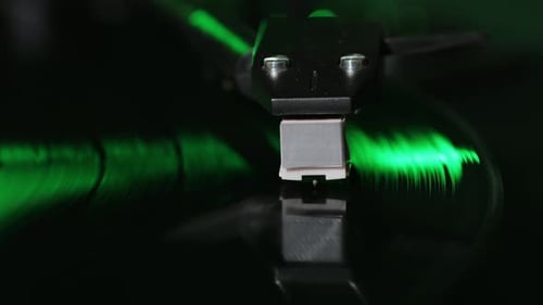 Record Player Vinyl Turning in Dark Room