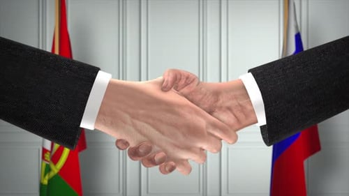 International Business Handshake with National Flags Background