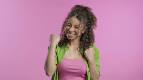 Young Woman Shows Triumph Yes Gesture of Victory Glad Teenager Girl Won Winner