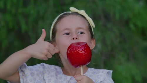 Closeup View of a Kid Eating Tasty Sweet Dessert