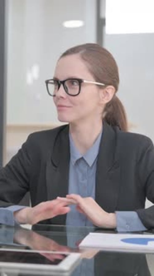 Businesswoman Talking with Old Businessman in Office, vertical video