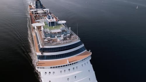 Aerial View of a Cruise Ship Leaving the Port Into the Open Ocean