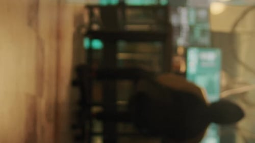 Vertical Video Silhouette of Cyber Criminal Coding Encryption to Plant Malware