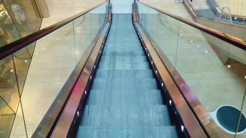 Descending Escalator Inside Modern Shopping Complex Interior Automated Stairway Transporting