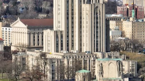 Cathedral of Learning at Pitt. Long aerial zoom rising shot of University of Pittsburgh gothic build