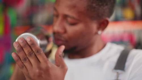 Mixing Alcoholic Beverage in a Stainless Steel Shaker