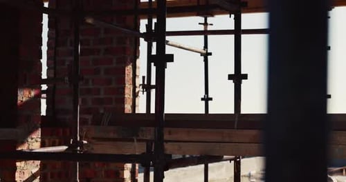 Building, scaffolding or planks on construction site for renovation, engineering