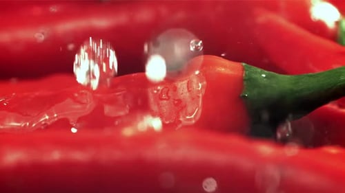 Drops of Water Fall on Chili Peppers Filmed on a Highspeed Camera at 1000 Fps