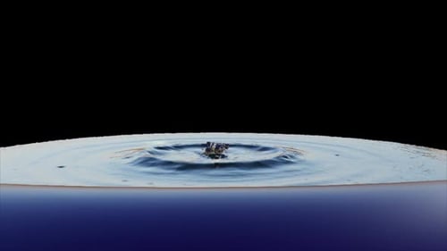 Falling drop of water into a pool with splash wave