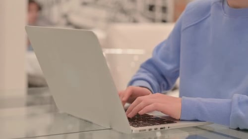 Close Up of Businesswoman Working on Laptop