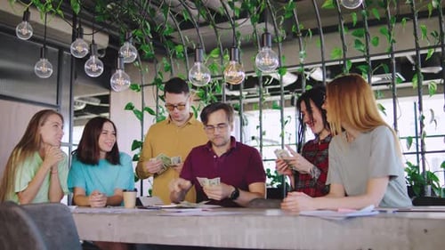 In a Lively Green Workspace a Dynamic Team Meeting Occurs Enhancing Creativity Fostering Innovation