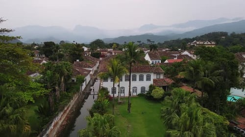 Colonial House and Lush Gardens in Historic Paraty Brazil Mountain Background