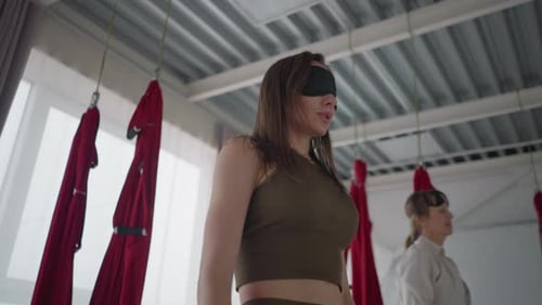 Balanced Souls Blindfolded And Resting In Calm Yoga Studio