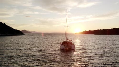 Sailboat at Sunset on the Water