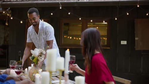 Friends Toasting Wine Glasses at Outdoor Celebration