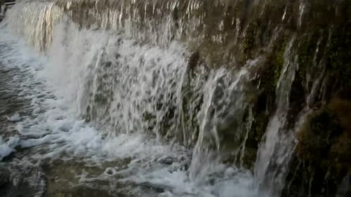 Catching a waterfall in a small freshwater channel.