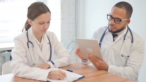 Team of Doctors Working Together in Hospital