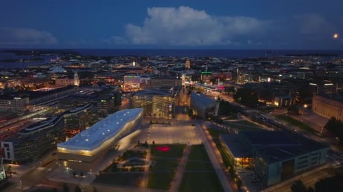 Aerial Panoramic View of Evening City on Sea Coast Forwards Fly Above Modern Urban Neighborhood