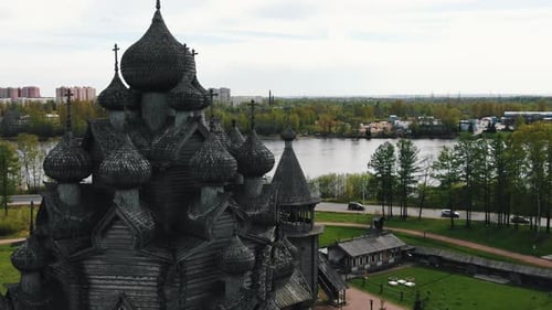 Temple Made of Wooden Planks and Large Domes with Crosses