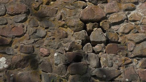 A close-up view of an ancient and gorgeous stone wall of Museum fortress Korela, Russia.