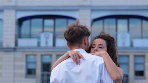 Close Up of Young Couple in Elegant Clothes Dancing Together Having Romantic Date on Rooftop