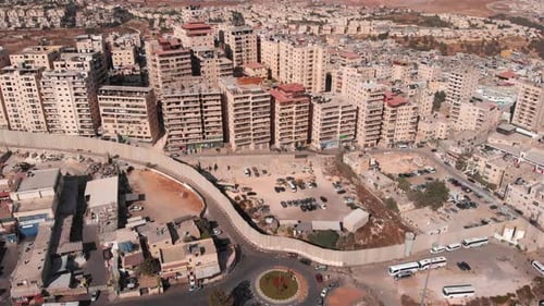 Aerial footage of Palestinian Refugge camp Surrounded By security Concerete Wall